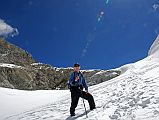 Rolwaling 07 13 Jerome Ryan Almost At The Tashi Lapcha Pass Jerome Ryan rests on the final snow slope to the Tashi (Tesi) Lapcha pass.